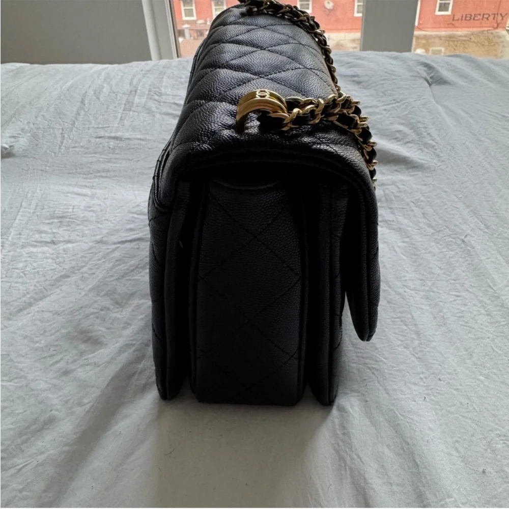 Chanel small Coco First bag black quilted caviar leather
